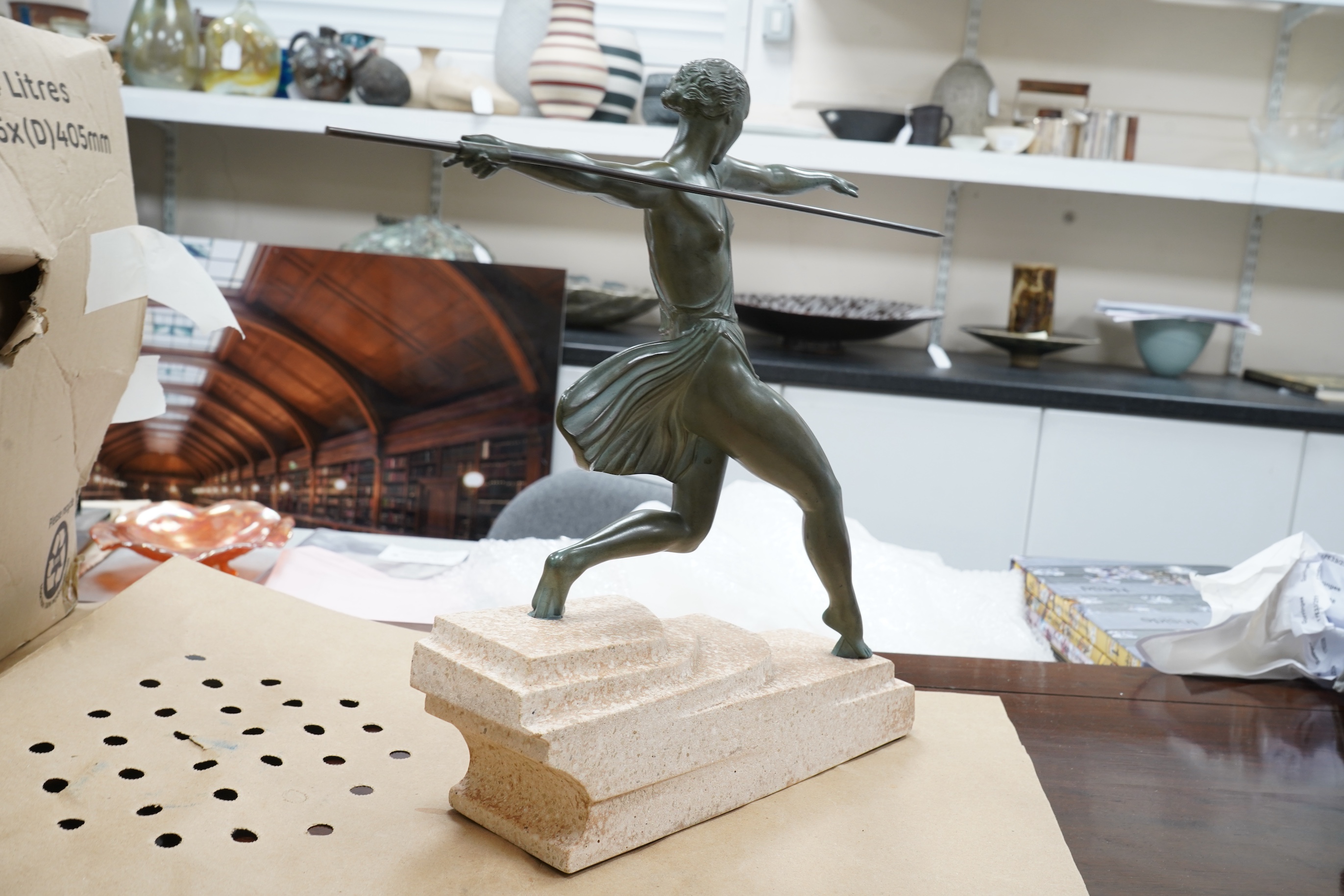 Pierre Le Faguays, (Fayral) - Bronzed metal on stone, ‘the huntress’. 42cm wide x 39cm high